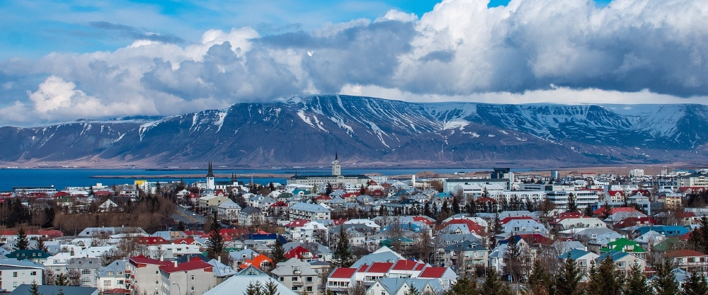 Urban landscape of Reykjavík, Iceland, showcasing Nordic architecture and the subarctic natural environment, a significant destination for studies in geology and renewable energy.